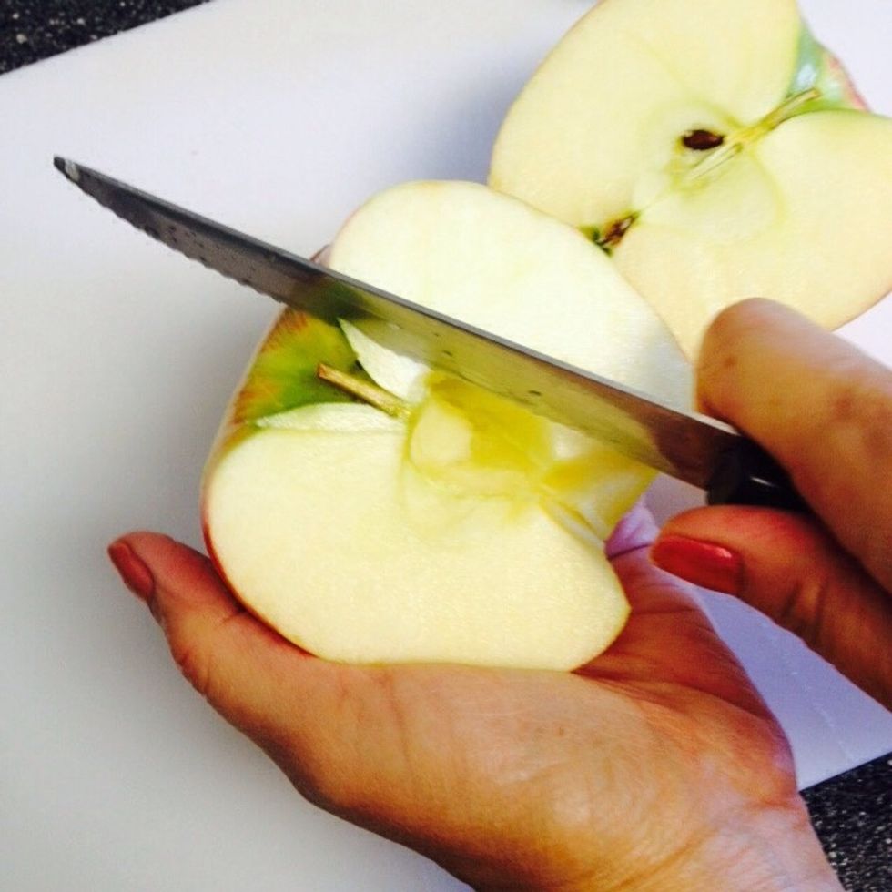 Cut one Honeycrisp apple and take out the core. Meanwhile you can preheat oven to 375*