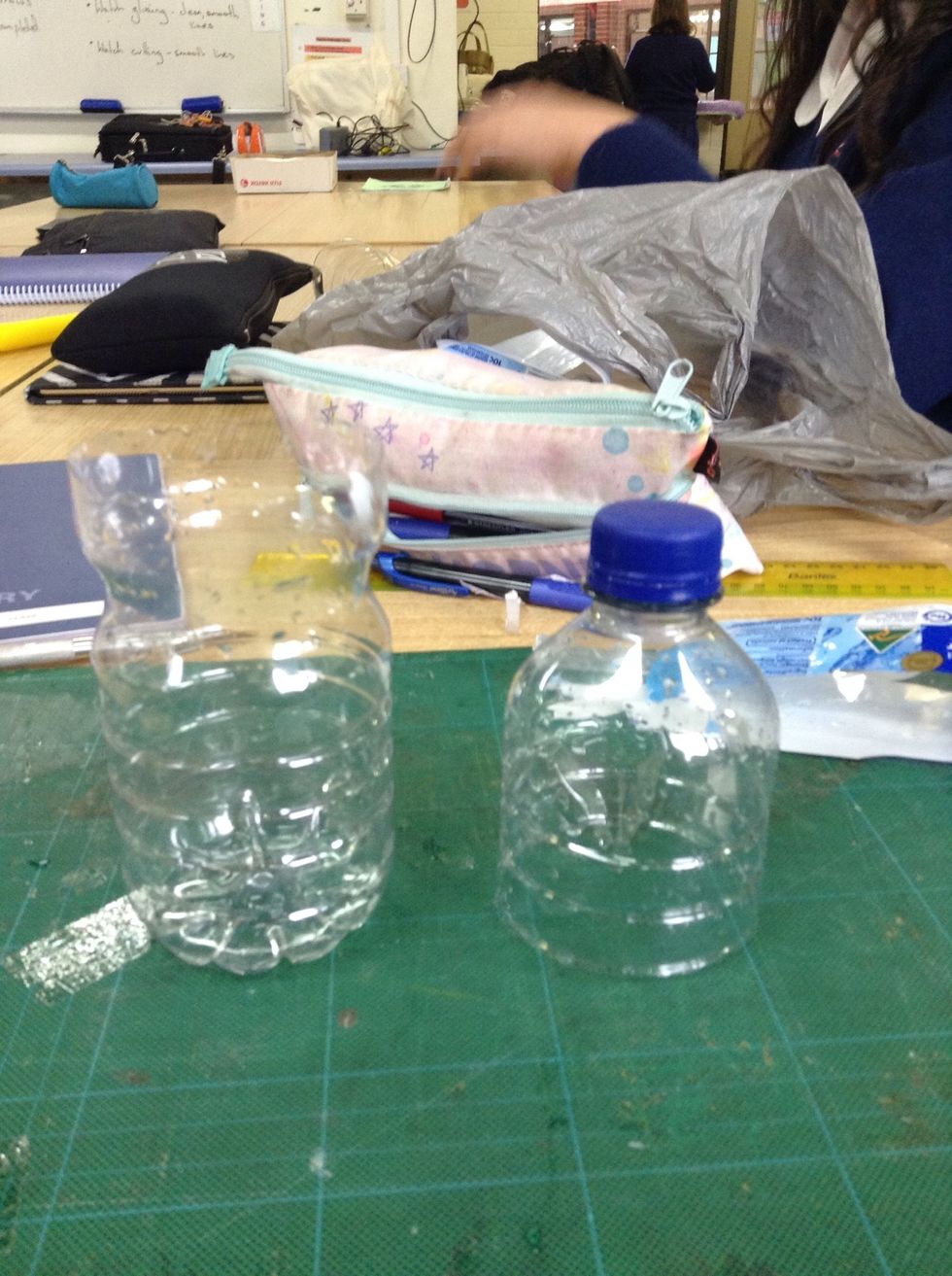 Cut one plastic bottle like this