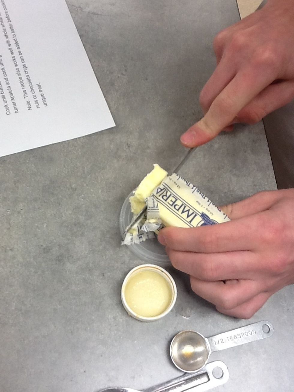 Cut one tablespoon of butter..