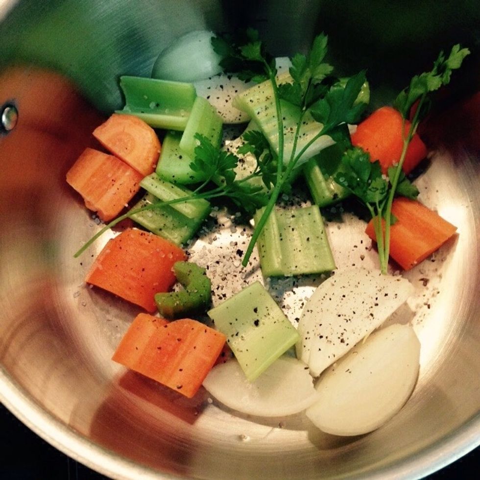Cut onion, celery and carrots into pieces and add them to a pot together with few parsley branches, salt and pepper