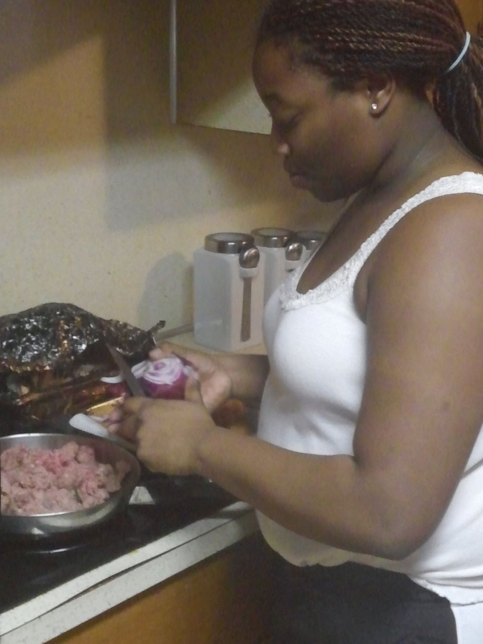 Cut onions into ground beef and mix