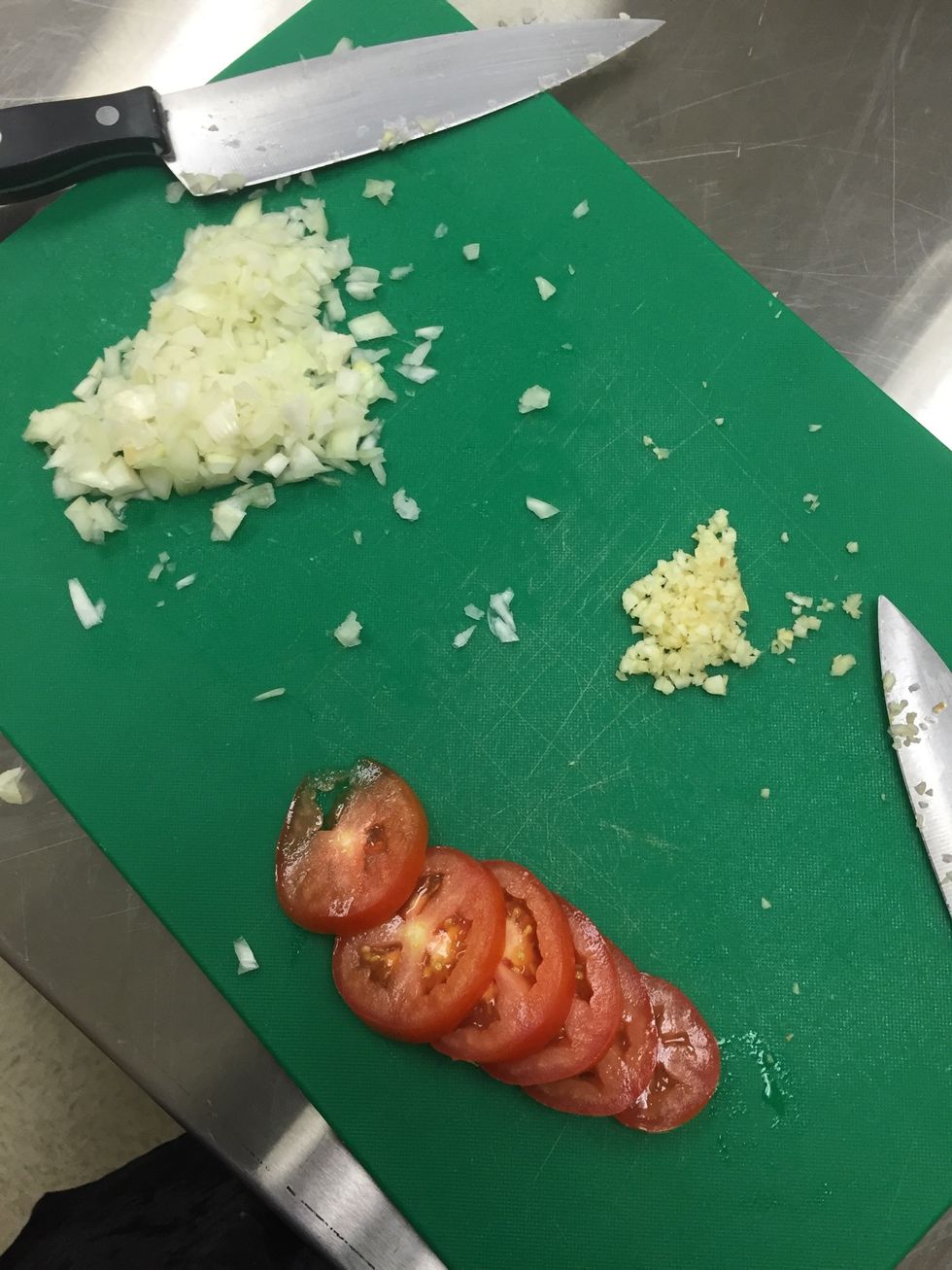cut onions, tomato, garlic & fresh basil leaves