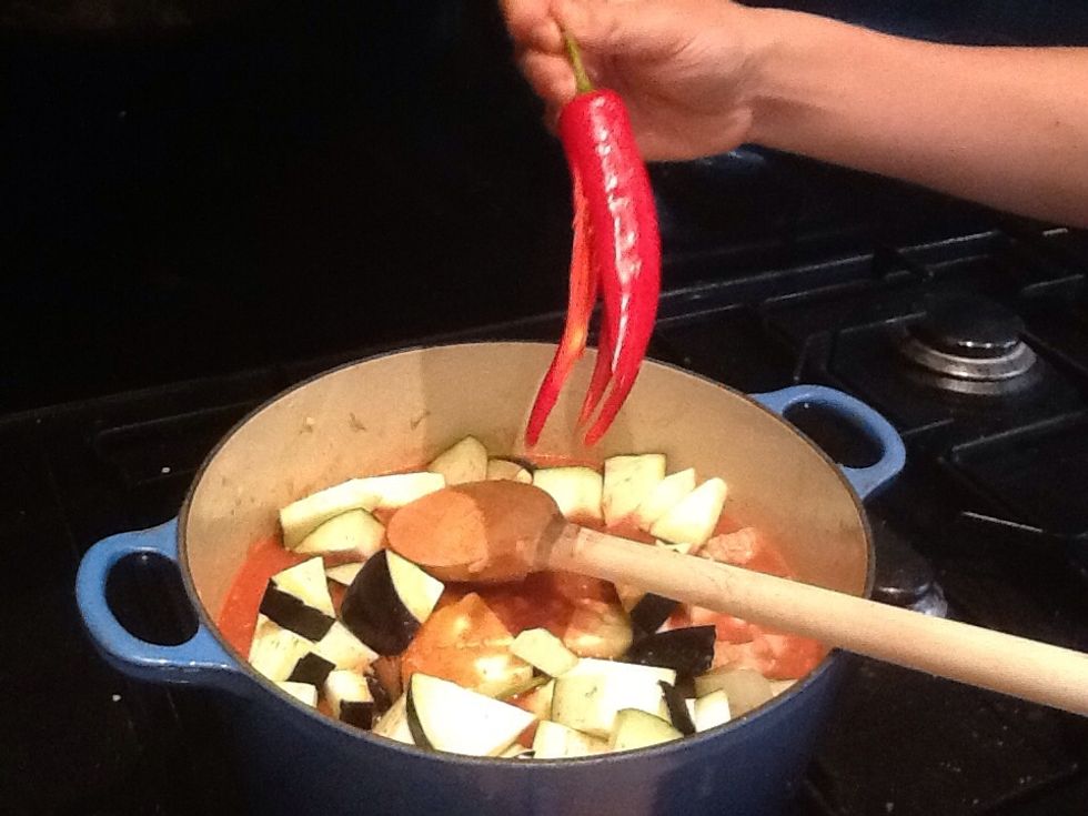 Cut open the chilli to help it infuse and then throw it in