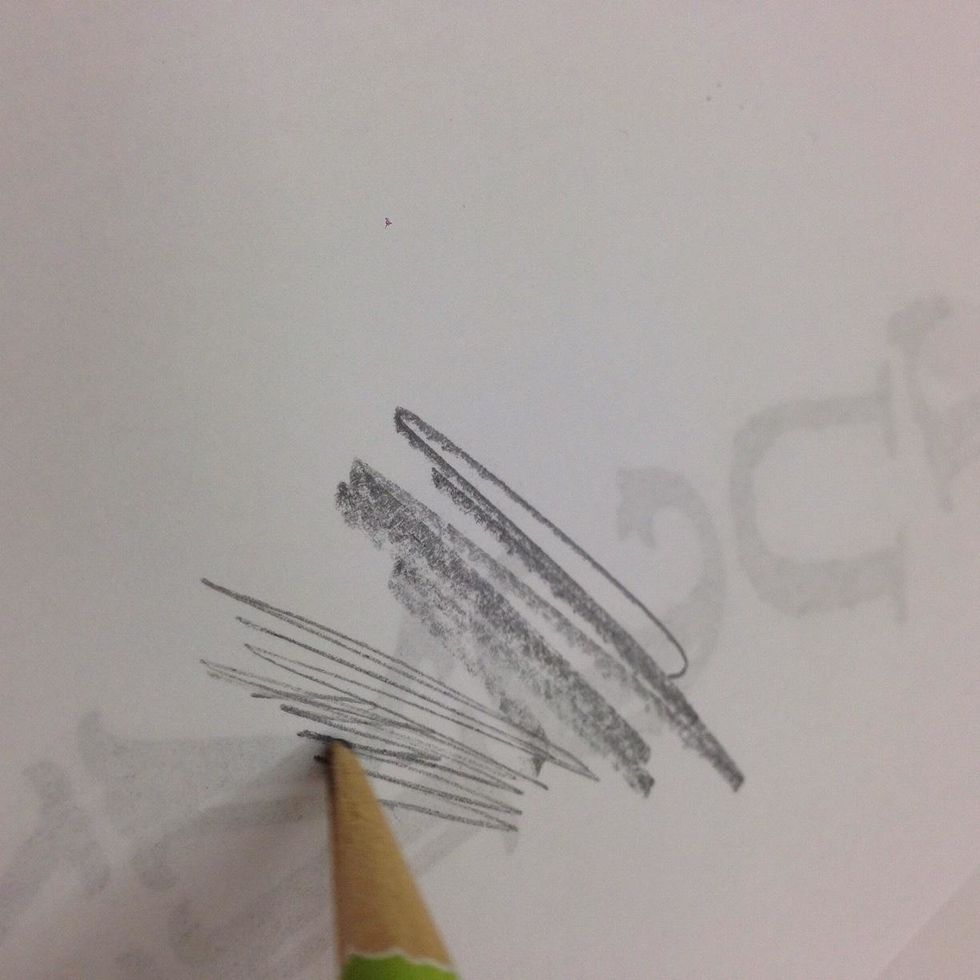 Cut or tear your word art so it will fit on your door hanger. Turn it over and scribble with a pencil all over the back.