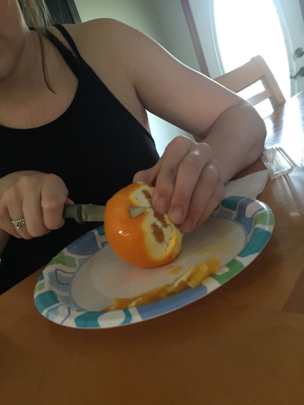 Cut orange into small peels