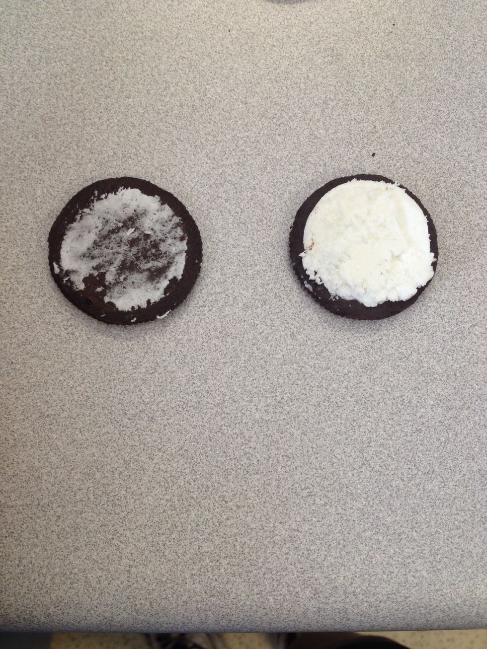 Cut Oreo biscuits in half. And keep the side with the most icing. May need to practice!
