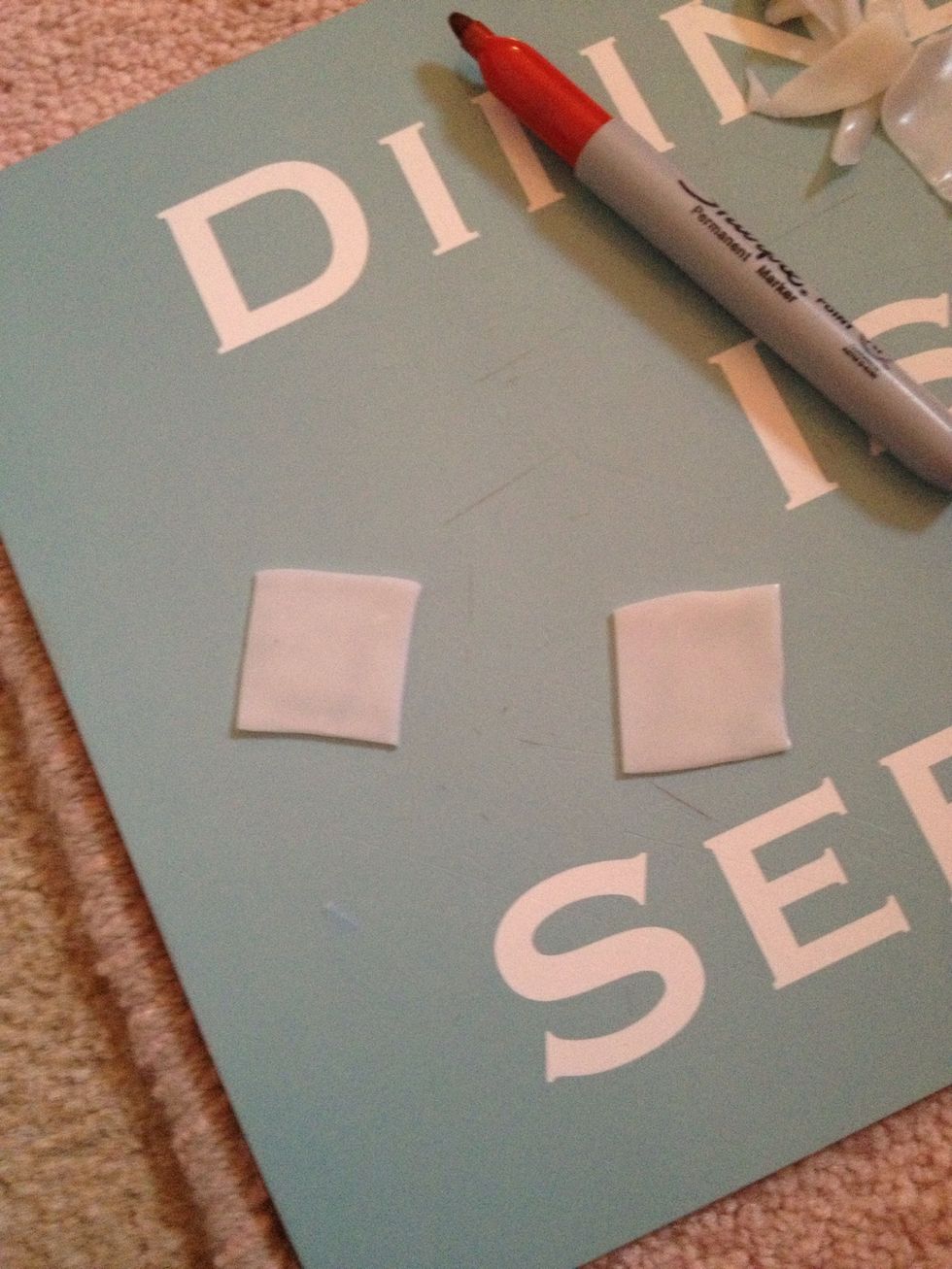 Cut out 2 equal size squares.