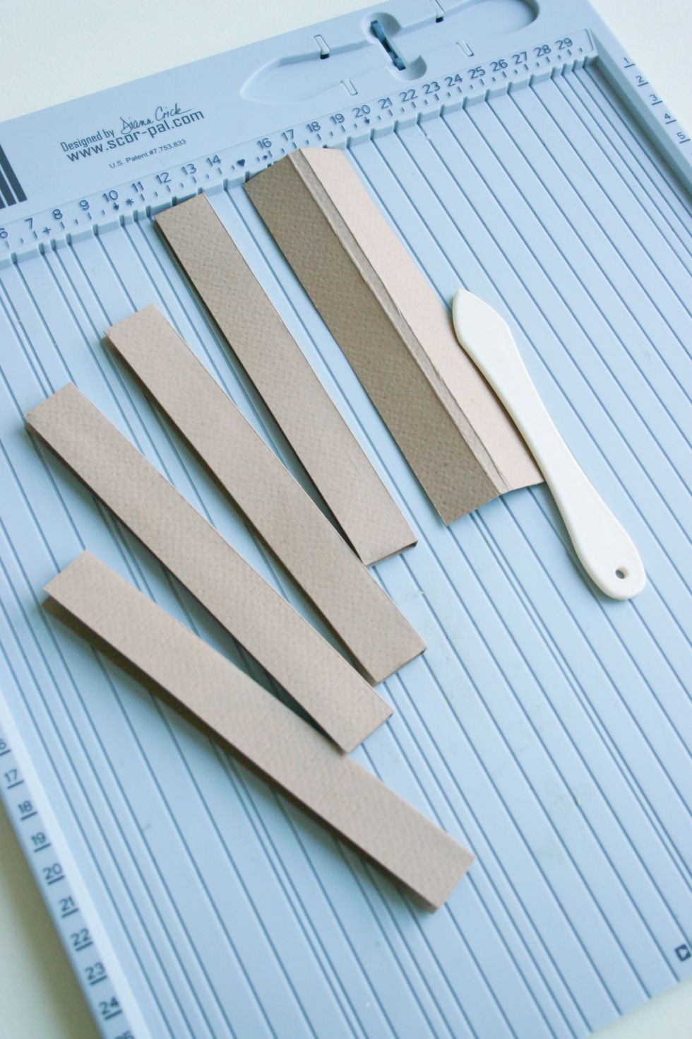Cut out a 5 sheets of paper 4,5/ 15 cm for cover and do the scoring in the middle of the sheet width 0.5 cm