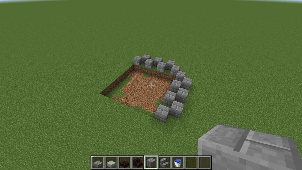 Cut out a 7x7 area into a level ground. The blocks on the side are used as an easy way to count the area, they will be removed.