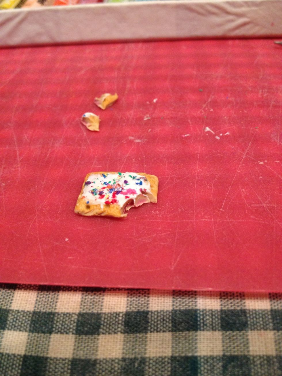 Cut out a corner to look like a bite. Now it's all set to bake!