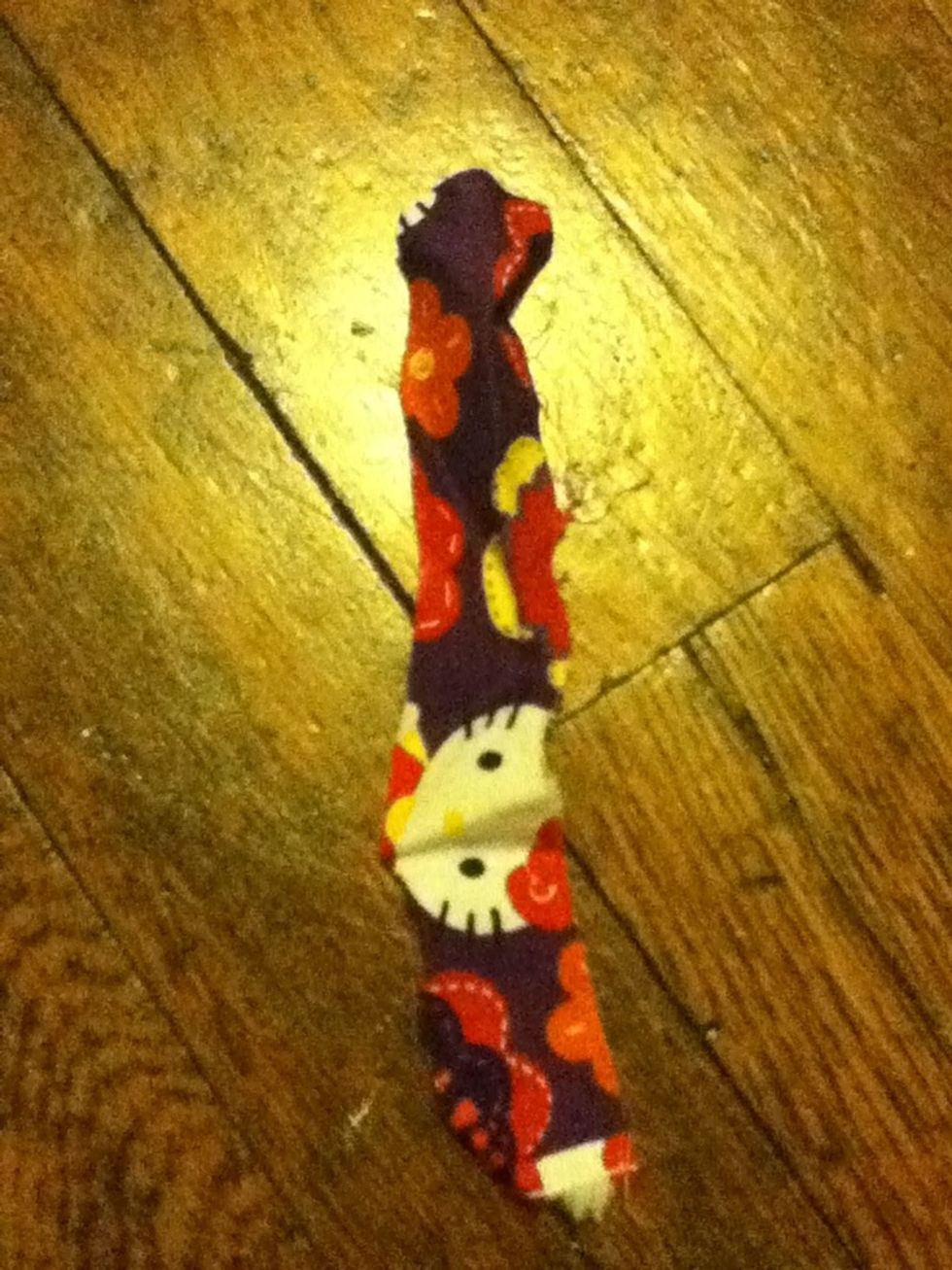 Cut out a long rectangle of fabric (not from the bow!) Sorry it's wrinkled up