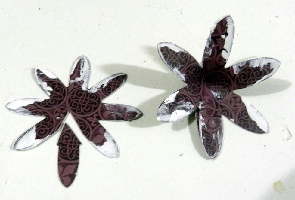 Cut out a petal of the G45 flower and glue down the last two one petals over one another.