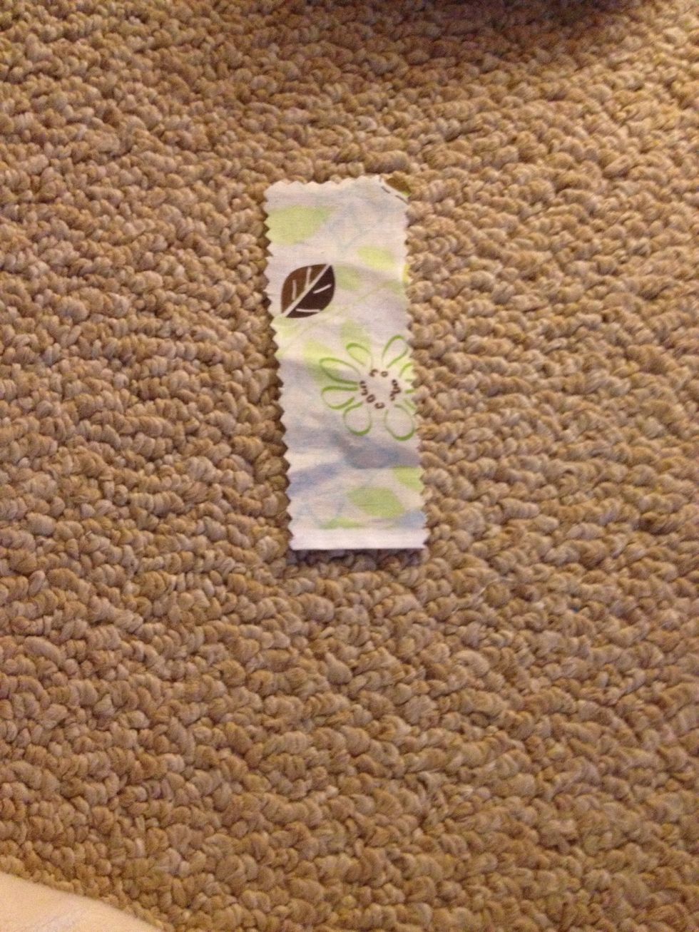 Cut out a piece of fabric that goes fully around your bow, then make sure it is wide enough to cover up your bows seam if you fold it in half.