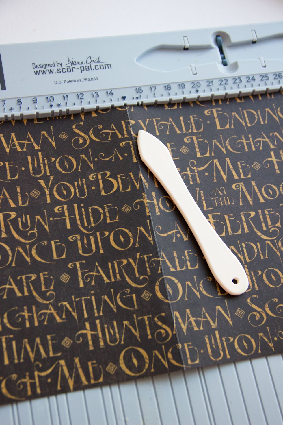 Cut out a piece of paper (size 30 / 18 centimeters) Make scoring on a middle of sheet. You need to have a card 15/18 centimeters! Use Graphic 45 An Eerie Tale Unsolved Mystery paper.