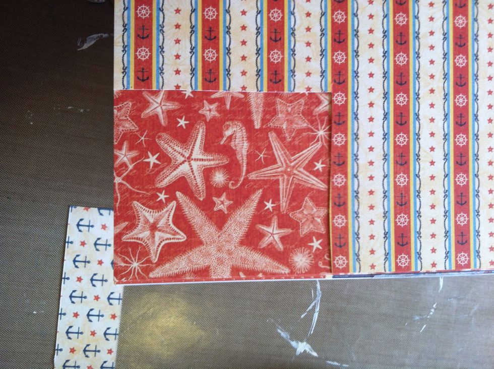 Cut out a piece of the anchor paper about 2.5" long and 1.25" tall. Corner round it.