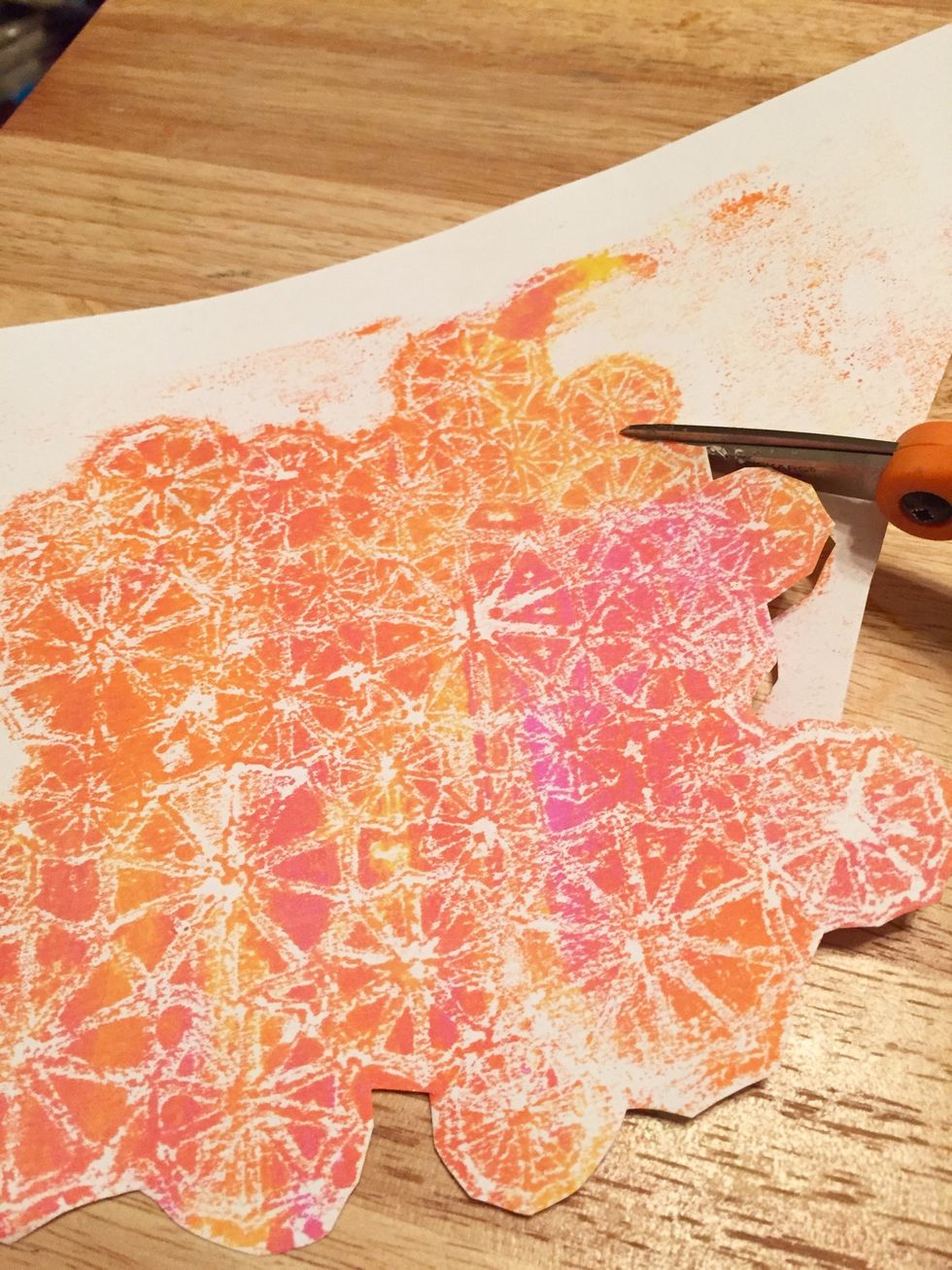 cut out a portion of the "ghost print" made using the parasol stencil.