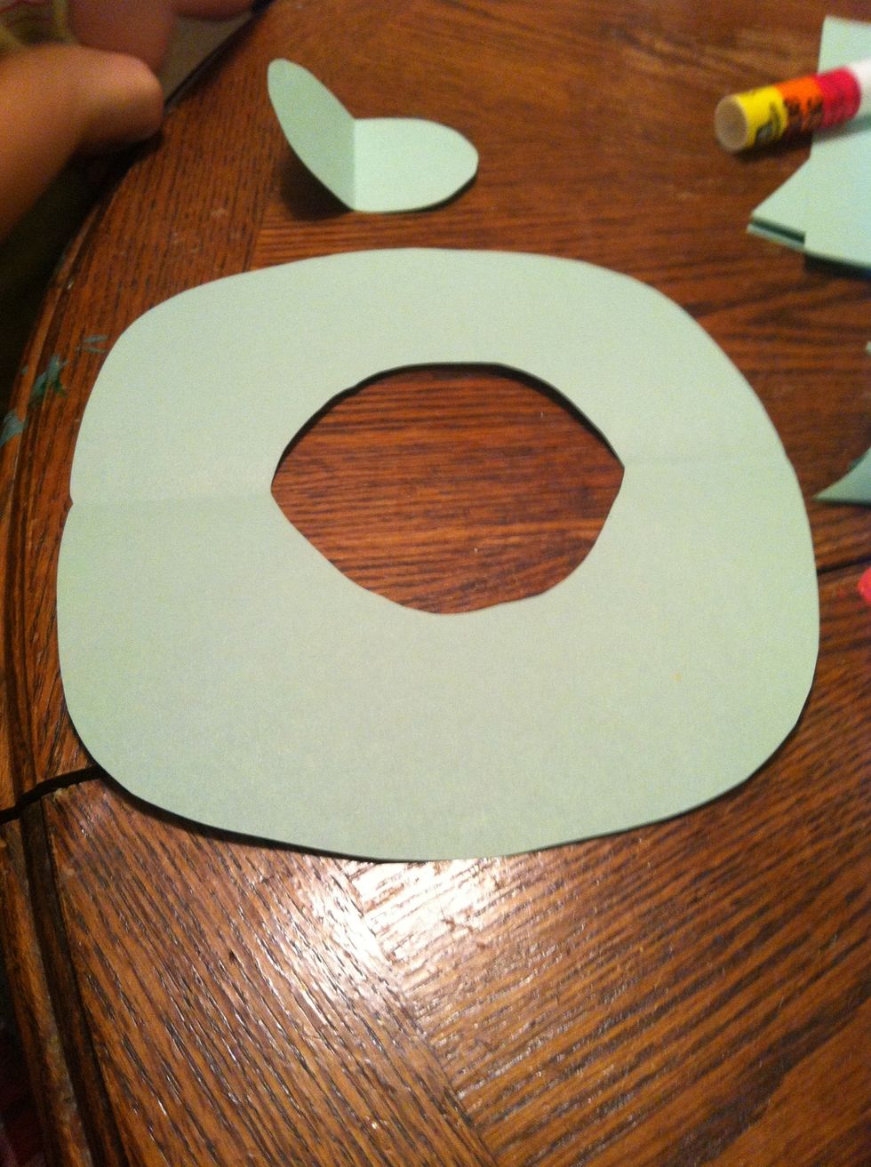 Cut out a rough wreath shape. Again perfection is pointless cause you won't see it. I do recommend starting much wider than you want it and trimming it down though.