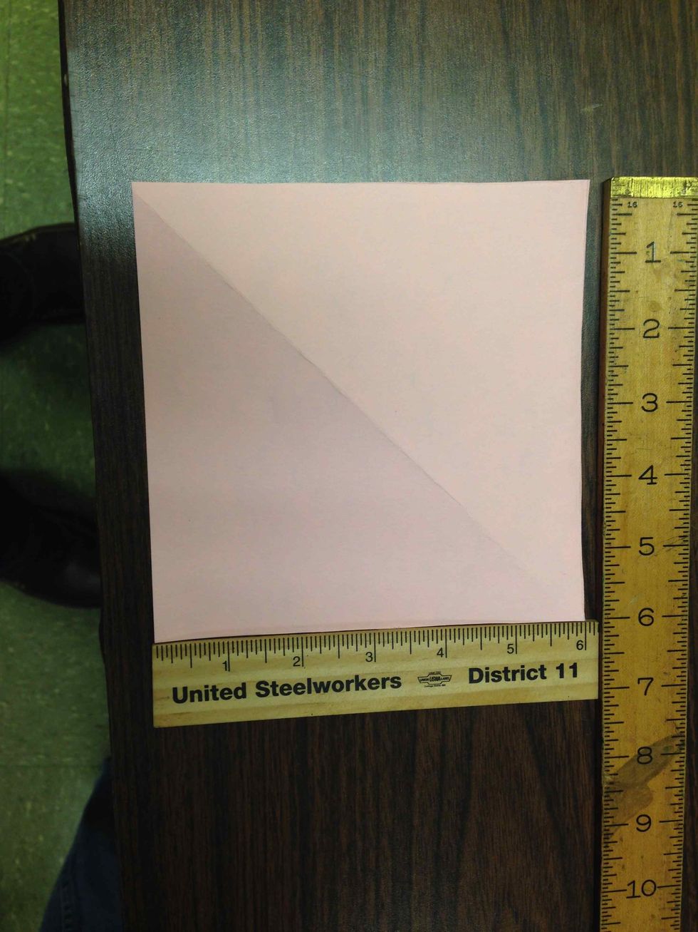 Cut out a six by six piece of paper.