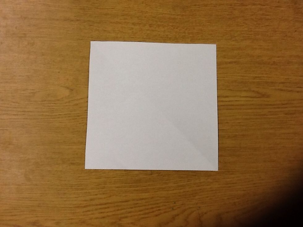Cut out a square piece of paper.