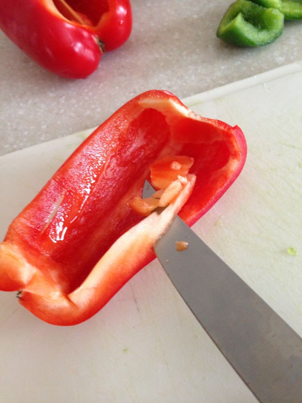 Cut out a third of the red and green peppers and get rid of the extra bits on the end.