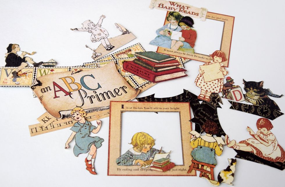 Cut out all little pictures from paper sheets and prepare some die-cuts. I add some vintage look to the paper with distress ink.