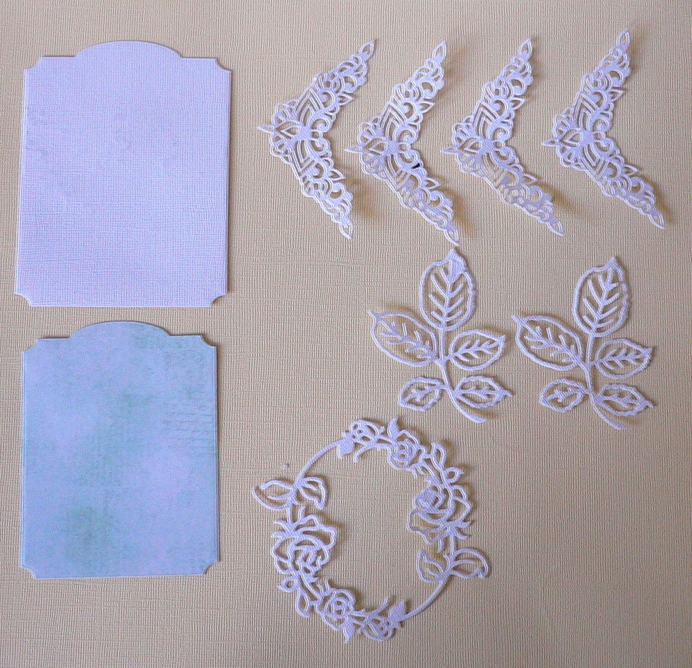 Cut out all the dies as shown in the photograph with Magnolia Lane die and white card stock. Cut Nesting Vintage Sign die with white card and a slightly smaller Nesting Vintage Sign with green paper