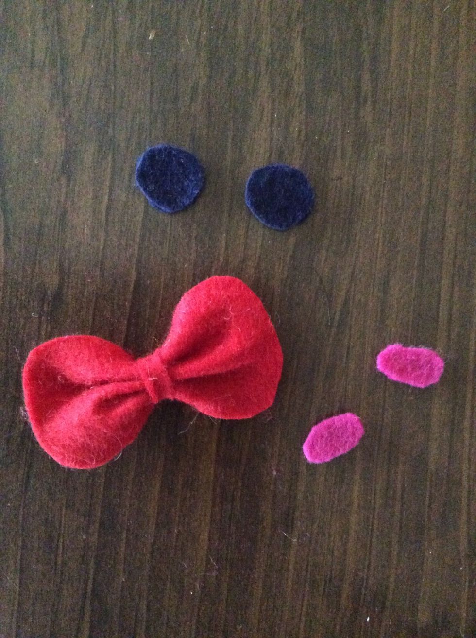 Cut out any facial features desired. (a mustache, bow, eyes, eyebrows, mouth, rosy cheeks, etc.)