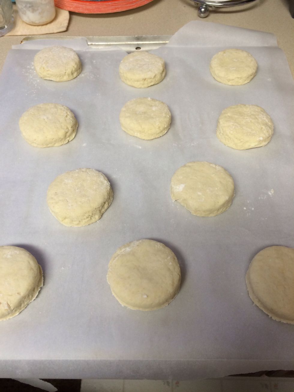 Cut out biscuits and then quickly fold remaining dough together to get more biscuits out of it. Bake for 10-12 minutes or until golden brown