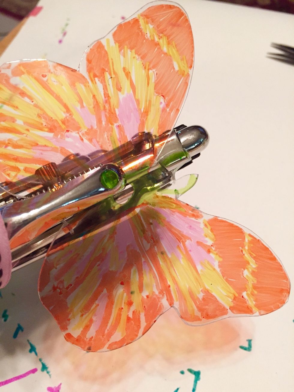 cut out butterfly and punch hole at center; bake.