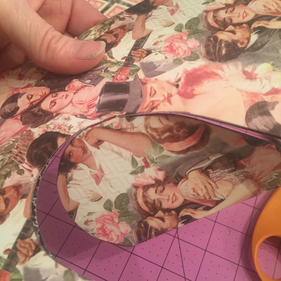 Cut out by following the line, but stopping at the RED line. I REPEAT DO NOT CUT THROUGH THE RED LINE!!