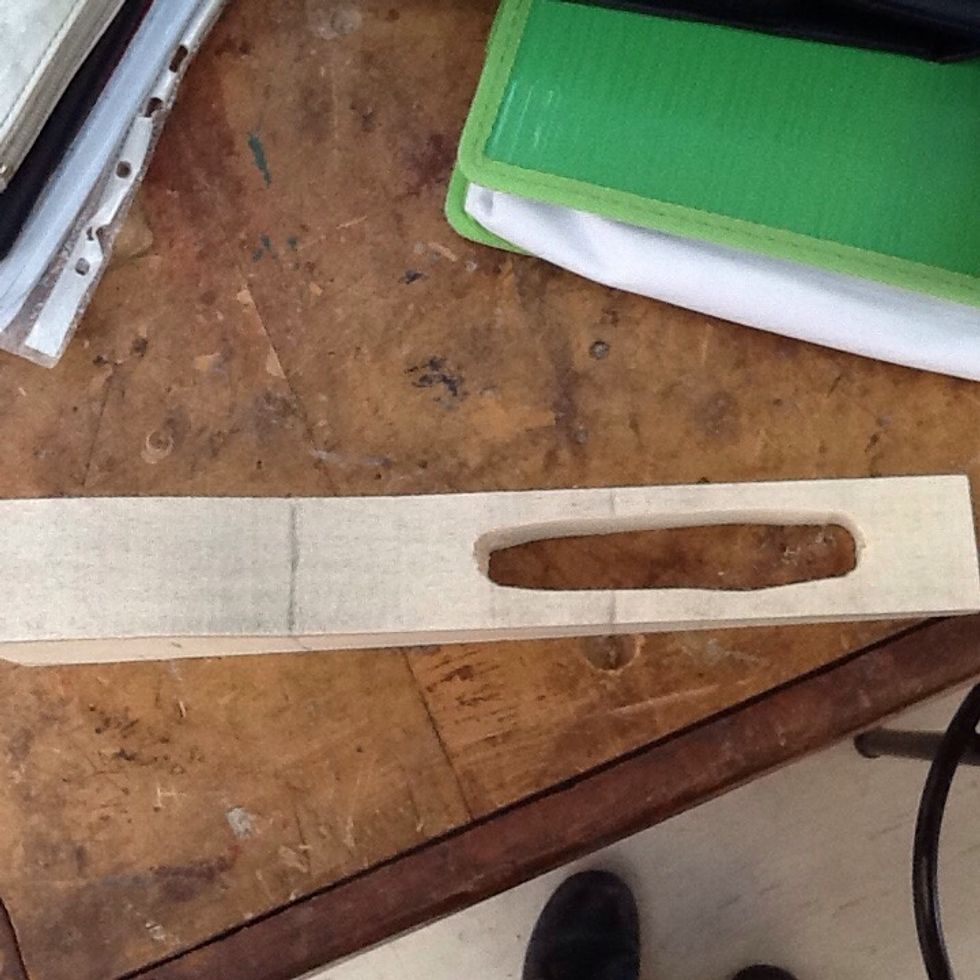 Cut out excess wood to reduce weight of car and sand to regulations