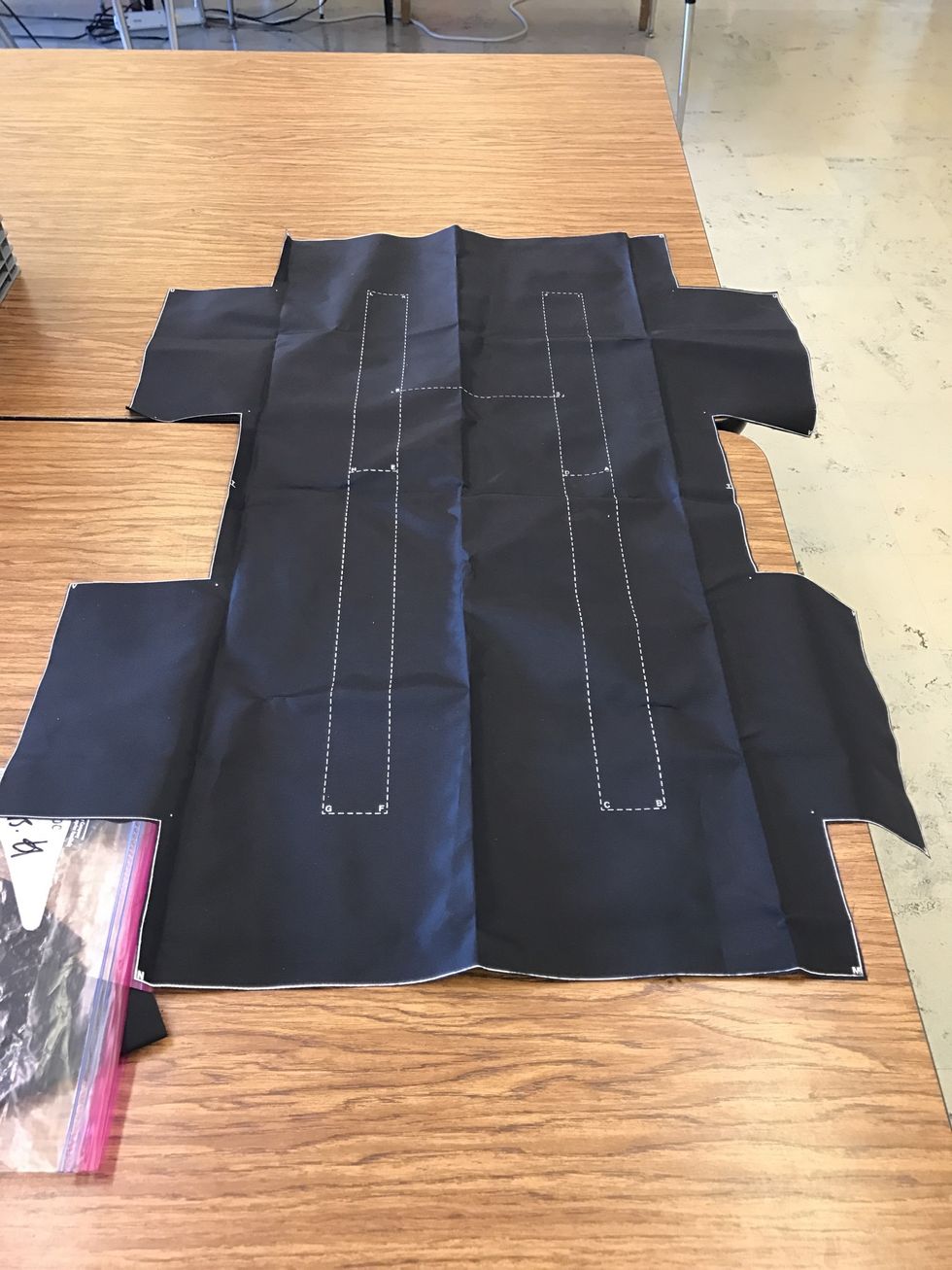 Cut out fabric along solid lines