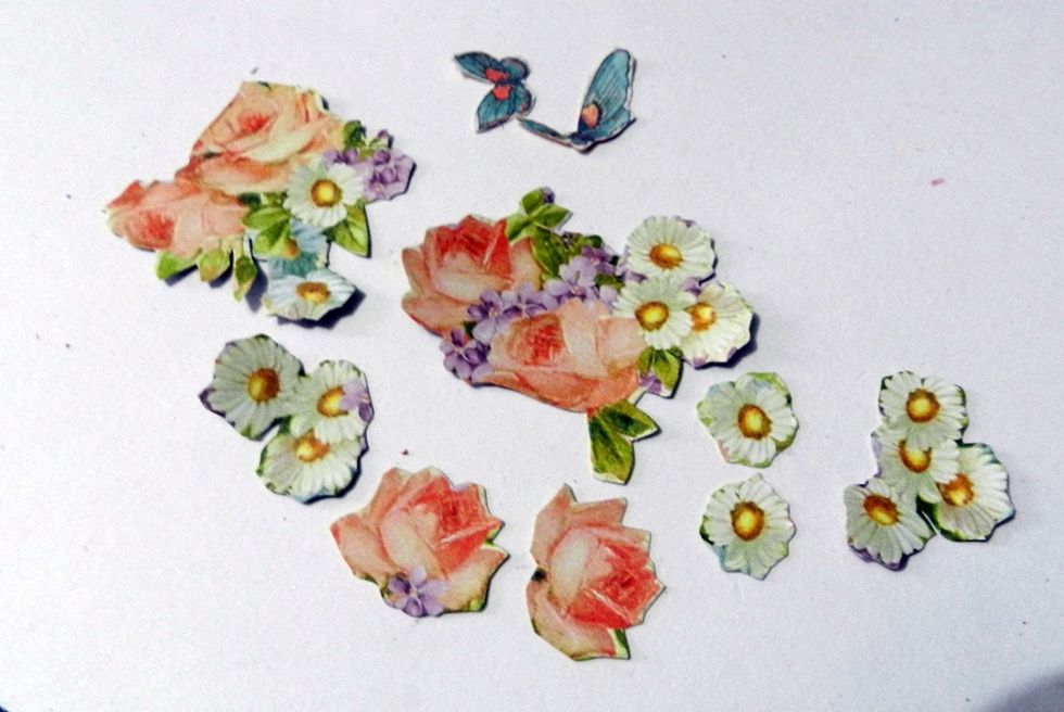Cut out some flowers and butterflies from G45 papers.