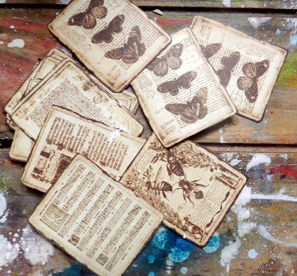 Cut out some tags from G45 Botanicabella Deluxor Collector\u2019s Edition.