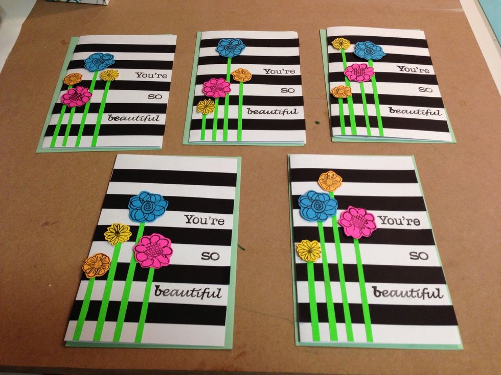 Cut out stems, stamp your message and assemble stripes and flowers.
