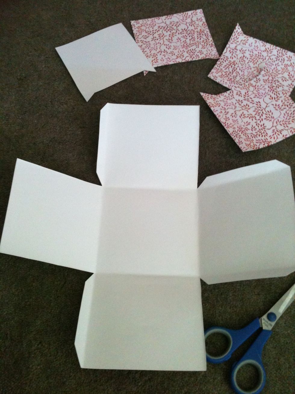 Cut out the 4 corner squares but cut out a tab so you can stick it to the sides without seeing the sticky tape