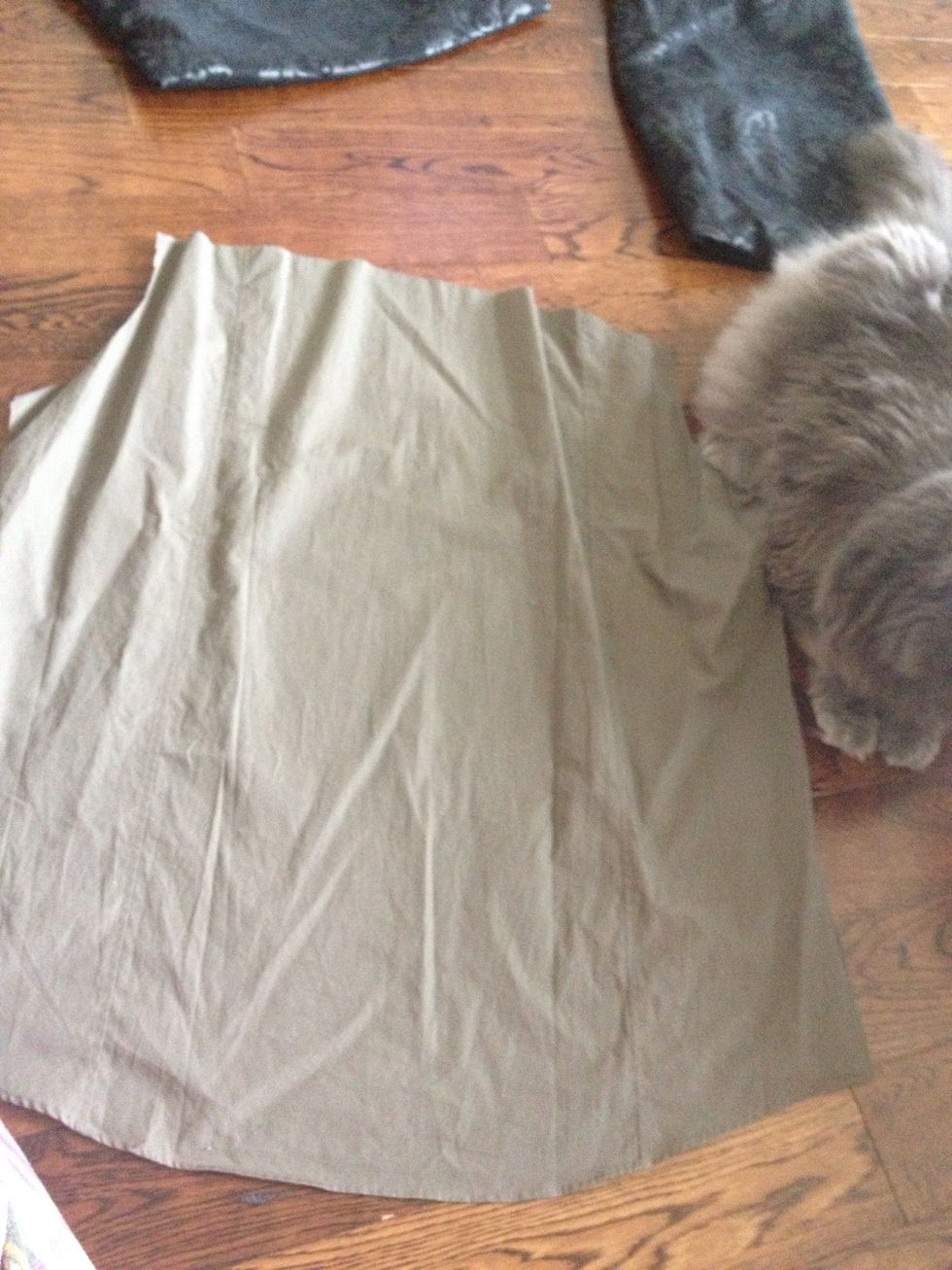 Cut out the back of the other shirt so you don't have buttons