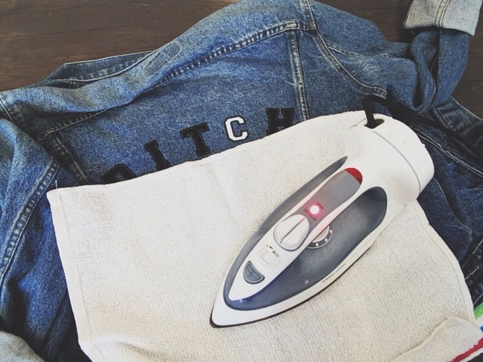 Cut out the individual letters that you would like to use and iron them on one-by-one.
