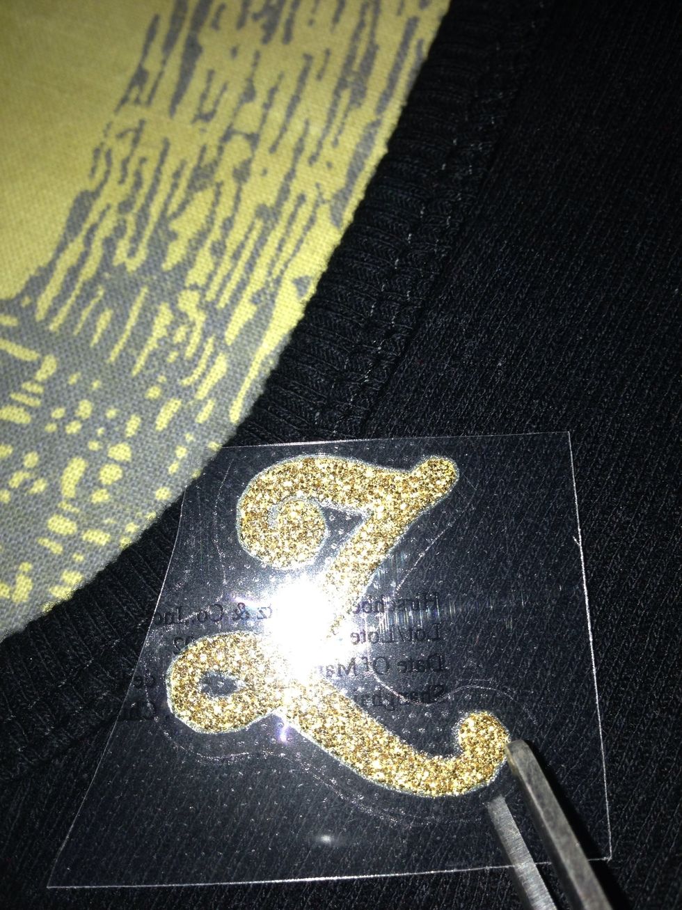 Cut out the letters you plan to use. Be sure to cut close to each letter without actually cutting into the letter. This makes it easier to peel off the plastic cover.
