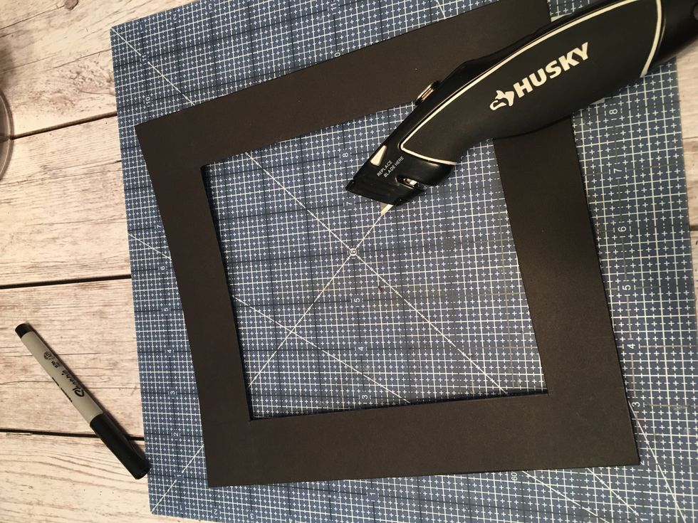 Cut out the marked center square with a craft knife. Be sure to cut on a craft mat and not your table!