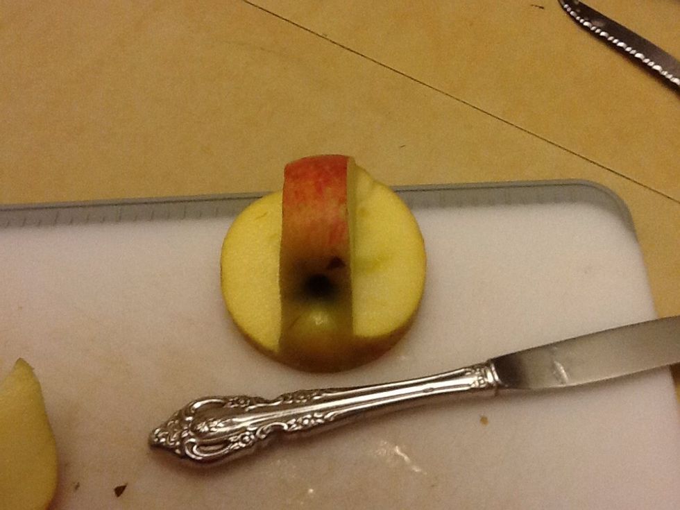 Cut out the middle of the apple using 2 objects to cut straight horizontally