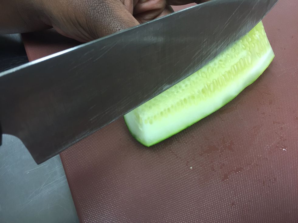 Cut out the seeded core of the cucumber.