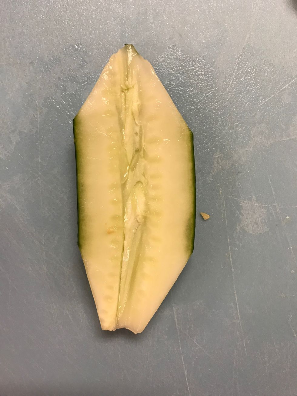 Cut out the seeds out of the center of the cucumber.