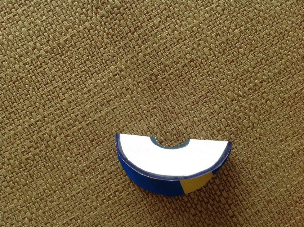 Cut out the smaller circle using its lines.