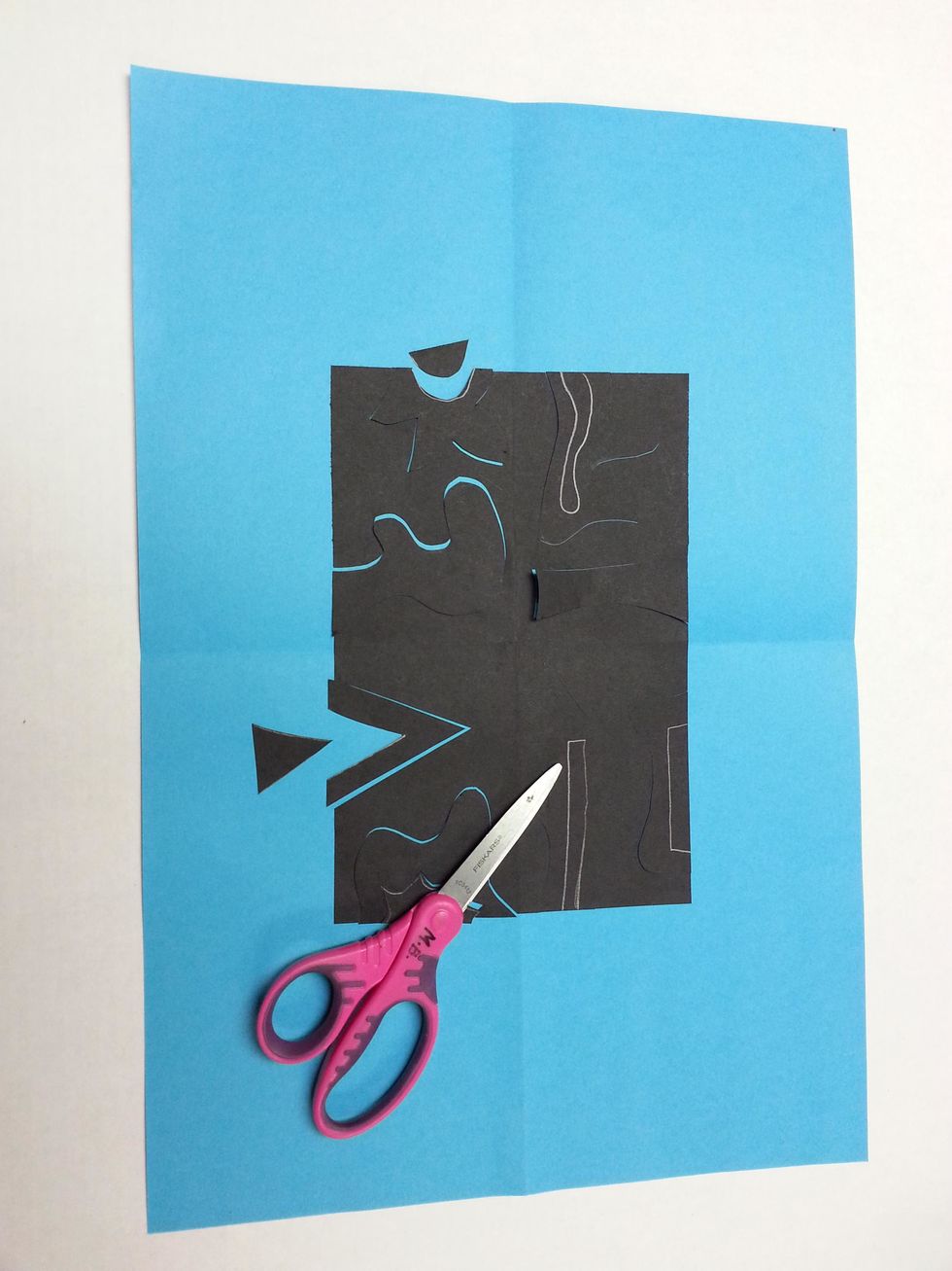 Cut out the smaller shapes. Keep ALL pieces. Put the rest of the puzzle together.