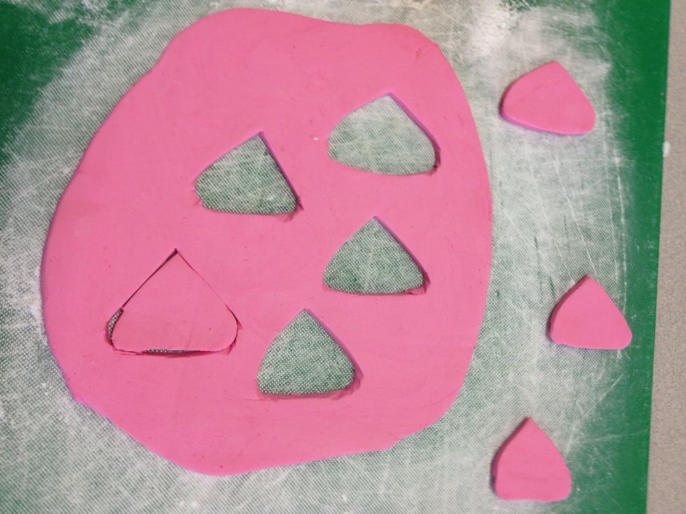 Cut out triangles for the fishes bodies!