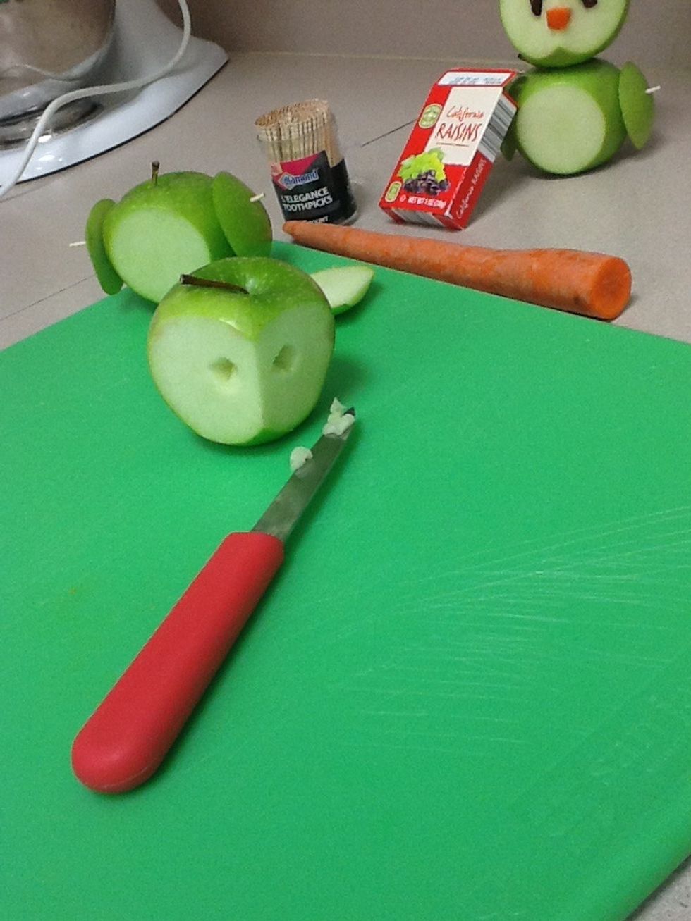 Cut out two holes with a paring knife for eyes