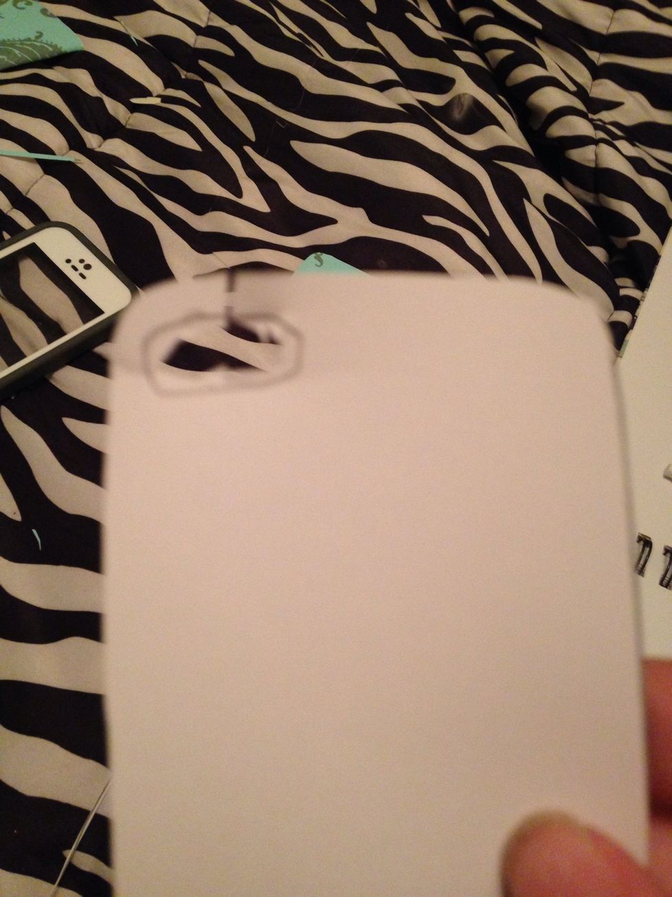 Cut out your camera hole( may be messy but it will turn out)