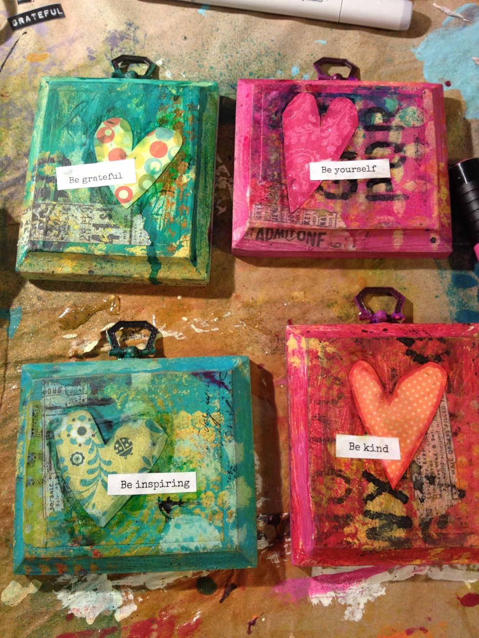 Cut out your words or quotes and adhere them using mod podge or gel medium. Lightly shade around them in gray to help them blend in. Spray with fixative to prevent inks from running.