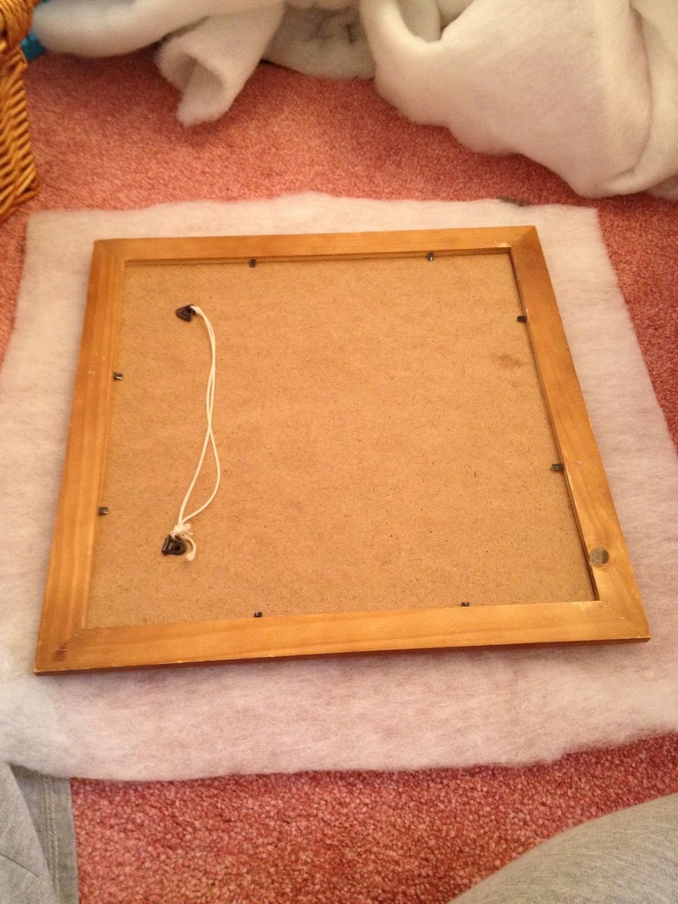 Cut padding a bit bigger then your frame and lay face down ready to staple